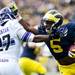 Michigan running back Justice Hayes runs the ball during the first half of the game against Northwestern on Saturday. The game is tied 14-14. Daniel Brenner I AnnArbor.com