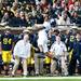 The Michigan team and fans watch a Northwestern reception on Saturday. Daniel Brenner I AnnArbor.com