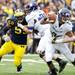 Michigan defensive tackle Jibreel Black tries to get to Northwestern quarterback Kain Colter on Saturday. Daniel Brenner I AnnArbor.com