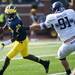 Michigan quarterback Devin Gardner avoids a tackle in the game against Northwestern on Saturday. Daniel Brenner I AnnArbor.com