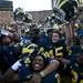 The Michigan football team celebrates after the game against Northwestern on Saturday. Michigan won 38-31. Daniel Brenner I AnnArbor.com