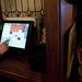 A waitress uses a computer at Haab's Restaurant in Ypsilanti on Friday. Owner Mike Kabat says he wouldn't use the compute system if the I.R.S. didn't require it. Daniel Brenner I AnnArbor.com