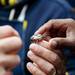 Tailgaters inspect a championship ring on Saturday. Daniel Brenner I AnnArbor.com