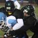 Skyline's Torrey Juide is gang tackled as Ann Arbor Huron took on Ann Arbor Skyline Friday September 30, 2011 at Huron High School. Skyline won the game 28-12. Jeff Sainlar I AnnArbor.com 
