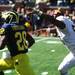 Minnesota's Aaron Hill tries to tackle Fitzgerald Toussaint first down attempt as Michigan took on the University of Minnesota Saturday October 1, 2011. Jeff Sainlar I AnnArbor.com 
