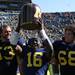 Denard Robinsonn gets a turn with the brown jug as Michigan took on the University of Minnesota Saturday October 1, 2011. Michigan won the game 58-0 Jeff Sainlar I AnnArbor.com 
