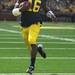 Denard Robinson runs in his nine-yard touchdown in the first quarter as Michigan took on the University of Minnesota Saturday October 1, 2011. Michigan won the game 58-0 Jeff Sainlar I AnnArbor.com 
