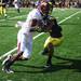 Minnesota's Da'Jon McKnight is tackled by Troy Woolfolk as Michigan took on the University of Minnesota Saturday October 1, 2011. Michigan won the game 58-0 Jeff Sainlar I AnnArbor.com 
