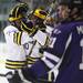 Michigan's Mac Bennett and Travis Lynch celebrate after scoring a goal as Michigan took on Niagara University in their season opener at Yost Ice Arena Tuesday October, 4, 2011. Michigan won the match 5-0. Jeff Sainlar I AnnArbor.com