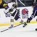 Michigan's Derek DeBlois fires a shot as Michigan took on Niagara University in their season opener at Yost Ice Arena Tuesday October, 4, 2011. Michigan won the match 5-0. Jeff Sainlar I AnnArbor.com