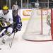 Michigan's Lee Moffie and Marc Zanette battle for the puck while Shawn Hunwick looks on as Michigan took on Niagara University in their season opener at Yost Ice Arena Tuesday October, 4, 2011. Michigan won the match 5-0. Jeff Sainlar I AnnArbor.com