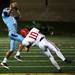 Skyline's Theron Wilson makes a jumping catch over Zach Hadley as the Skyline Eagles took on the Bedford Mules at Skyline High School Thursday October 6, 2011. Bedford won the game 23-20. Jeff Sainlar I AnnArbor.com