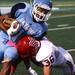 Skyline's Jordan Woods is tackled by Spencer Cimmerman as the Skyline Eagles took on the Bedford Mules at Skyline High School Thursday October 6, 2011. Bedford won the game 23-20. Jeff Sainlar I AnnArbor.com