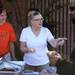 Maggie Miller(left) and Kim Bailey hand out food at the "Meet on the Street Community Block Party," out in front of Grace Fellowship Church in Ypsilanti  Saturday October 8, 2011. Pastor Willie J. Powell of Grace Fellowship Church along with Pastor Julianne Smeck of St. Mark Lutheran Church decided to put this on together to connect the communities. Jeff Sainlar I AnnArbor.com