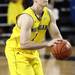 Stu Douglass shoots around at the University of Michigan's men and women's media day Tuesday October 11, 2011. Jeff Sainlar I AnnArbor.com