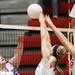 Whitmore defenders, Lauren Bowen(left) and Maddie Carpenter go to block Tessa Madrea's shot as Whitmore Lake took on Britton Deerfield at Whitmore High School. Whitmore won the best of five series 3-0. Tuesday October 11, 2011. Jeff Sainlar I AnnArbor.com