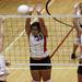 Whitmore's Samantha Ireman tries to spike it home while Jasmine Jacobs(35) and McKayla Herriman go for the block as Whitmore Lake took on Britton Deerfield at Whitmore High School. Whitmore won the best of five series 3-0. Tuesday October 11, 2011. Jeff Sainlar I AnnArbor.com