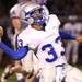 Lincoln's Tyree Waller connects on a trick play pass for a touchdown as Ypsilanti took on Lincoln High School at Ypsilanti High School Friday October 14, 2011.  Lincoln won the game 27-12 to advance to their first ever playoff berth.  Jeff Sainlar I AnnArbor.com