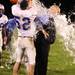 Lincoln's head coach Chris Westfall gets doused with water by Ryan Yeager as Ypsilanti took on Lincoln High School at Ypsilanti High School Friday October 14, 2011.  Lincoln won the game 27-12 to advance to their first ever playoff berth.  Jeff Sainlar I AnnArbor.com