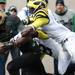 Michigan's Courtney Avery can't do enough to stop Keshawn Martin's touchdown as Michigan took on Michigan State Saturday October 15, 2011 at Spartan Stadium. Michigan State won the game 28-14.  Jeff Sainlar I AnnArbor.com 