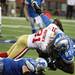 Brandon Pettigrew is tackled by Donte Whitner as the Detroit Lions took on the San Francisco 49ers Sunday October 16, 2011 at Ford Field. San Francisco  won the game 25-19.  Jeff Sainlar I AnnArbor.com
