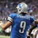 Matt Stafford looks for a open reciever as the Detroit Lions took on the San Francisco 49ers Sunday October 16, 2011 at Ford Field. San Francisco  won the game 25-19.  Jeff Sainlar I AnnArbor.com