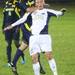 Michigan's Adam Shaw(left) and Luke Holmes battle for a header as the Michigan Wolverines took on the Akron Zips Tuesday, Oct. 18, 2011 at the Michigan Soccer Complex. Michigan defeated the No. 4 Zips, 1-0, in overtime.  Jeff Sainlar I AnnArbor.com
