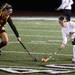 Mercy's Taylor Shrader(left) and Niki Atal battle for possession as Ann Arbor Huron took on Mercy High School Thursday October 27, 2011 at Dearborn Edsel Ford High School. Huron won 2-1 to advance to the championship game. Jeff Sainlar I AnnArbor.com