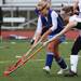 Ladywood's(left) Emma Ellswood battles with Molly Thompson over the ball as Pioneer took on Ladywood High School Thursday October 27, 2011 at Dearborn Edsel Ford High School. Pioneer won 3-0 to advance to the championship game. Jeff Sainlar I AnnArbor.com