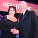 Evangelical Homes of Michigan CEO Denise Rabidoux poses with Health Care award presenter and ForeSee CEO Larry Freed at the Deals of the Year awards banquet at Eastern Michigan University Student Center on Friday, Nov. 4, 2011. Jeff Sainlar I AnnArbor.com