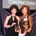 University of Michigan Health System CEO Dr. Ora Pescovitz (left) accepts the Construction and Development award from presenter and Ann Arbor Area Community Foundation CEO Cheryl Elliot at the Deals of the Year awards banquet at the Eastern Michigan University Student Center on Friday, Nov. 4, 2011. U-M's new C.S. Mott Children's Hospital and Von Voigtlander Women's Hospital was honored with the award. Jeff Sainlar I AnnArbor.com