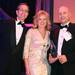 Honigman, Miller, Schwartz and Cohn managing partner David Parsigian (left) presents the Executive of the Year award to Adaptive Materials co-founders Michelle and Aaron Crumm at the Deals of the Year awards banquet at Eastern Michigan University Student Center on Friday, Nov. 4, 2011.  Jeff Sainlar I AnnArbor.com