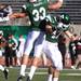Alex Bellfy(33) and Justin Cudworth celebrate after a defensive stop as Eastern Michigan University took on Ball State Saturday November 5, 2011 at Rynearson Stadium. Ball State won the game 33-31 Jeff Sainlar I AnnArbor.com