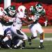 Dominque White tries to break a tackle as Eastern Michigan University took on Ball State Saturday November 5, 2011 at Rynearson Stadium. Ball State won the game 33-31 Jeff Sainlar I AnnArbor.com