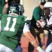 Ball State's Barrington Scott tries to blow past Nate Paopao as Eastern Michigan University took on Ball State Saturday November 5, 2011 at Rynearson Stadium. Ball State won the game 33-31 Jeff Sainlar I AnnArbor.com