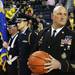 Chris Ploucha prepares to hand the game ball to officials as Michigan took on Ferris State at the Crisler Arena Friday November 11, 2011. (AP Photo/AnnArbor.com, Jeff Sainlar I AnnArbor.com)