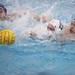 Huron's Nate Clyde(white cap) and Reizo Osawa go after the ball as Ann Arbor Pioneer took on Huron High School in the Michigan Water Polo State Championship Saturday November 12, 2011 at Saline High School. Pioneer took home the state title with a 6-5 victory. Jeff Sainlar I AnnArbor.com