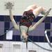 Allison Juchartz takes a dive as divers from Pioneer, Huron, and Saline participated in diving regionals at Pioneer High School November 15, 2011. Jeff Sainlar I AnnArbor.com