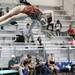 Diver Andrea Meister shows off her skills as divers from Pioneer, Huron, and Saline participated in diving regionals at Pioneer High School November 15, 2011. Jeff Sainlar I AnnArbor.com