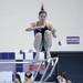 Molly Parks dives as divers from Pioneer, Huron, and Saline participated in diving regionals at Pioneer High School November 15, 2011. Jeff Sainlar I AnnArbor.com