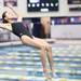 Pioneer's Christina Lu performs a dive as divers from Pioneer, Huron, and Saline participated in diving regionals at Pioneer High School November 15, 2011. Jeff Sainlar I AnnArbor.com