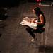 Russell Brand browses through a few headlines of the AnnArbor.com newspaper while he performed at the Eastern Michigan University Convocation  Center Wednesday November 16, 2011. Jeff Sainlar I AnnArbor.com