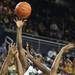 Tim Hardaway Jr. takes shoots the ball over defenders as the University of Michigan men's basketball team took on Western Illinois Thursday November 17, 2011 at the Crisler Arena. Michigan won the game 59-55. Jeff Sainlar I AnnArbor.com
