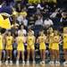 A cheerleader shows off his flipping ability as the University of Michigan men's basketball team took on Western Illinois Thursday November 17, 2011 at the Crisler Arena. Michigan won the game 59-55. Jeff Sainlar I AnnArbor.com