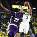 Trey Burke shoots it over Ceola Clark III as the University of Michigan men's basketball team took on Western Illinois Thursday November 17, 2011 at the Crisler Arena. Michigan won the game 59-55. Jeff Sainlar I AnnArbor.com