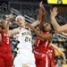Michigan's Jenny Ryan battls over a loose ball as the University of Michigan women's basketball team took on the University of Utah Utes Thursday November 17, 2011 at the Crisler Arena. Jeff Sainlar I AnnArbor.com