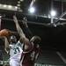 Anthony Strickland forces up a shot over Michael Javes as Eastern Michigan University took on Arkansas Little Rock Friday November 18, 2011 at the Convocation Center. Eastern Michigan won the game  62-51. Jeff Sainlar I AnnArbor.com