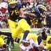 Denard Robinson gets tripped up in the first half as the University of Michigan took on Nebraska at Michigan Stadium Saturday November 19, 2011. Jeff Sainlar I AnnArbor.com