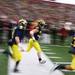 Michigan players run on to the field prior to the start of the game as the University of Michigan took on Nebraska at Michigan Stadium Saturday November 19, 2011. Jeff Sainlar I AnnArbor.com