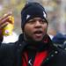 Former Nebraska Cornhusker and current Detroit Lion Nadakam Suh cheers along with the Nebraska's fight song as the University of Michigan took on Nebraska at Michigan Stadium Saturday November 19, 2011. Jeff Sainlar I AnnArbor.com